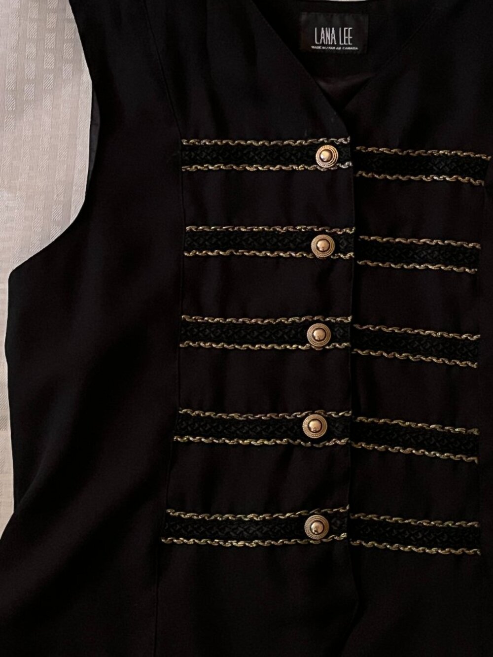 Black Vest for women size L 19" long-16" wide from LANA LEE with gold button.